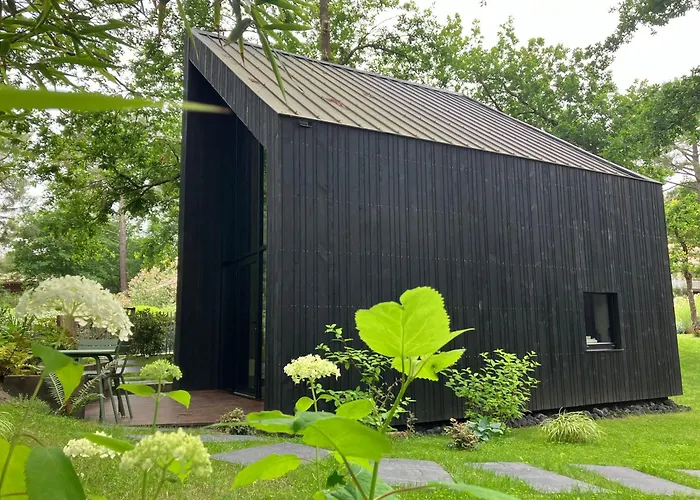 Ecolodge 'Calme et Nature' avec Piscine au Golf-Lac-Plages Océanes - Couchage 2 personnes Hébergement de vacances *